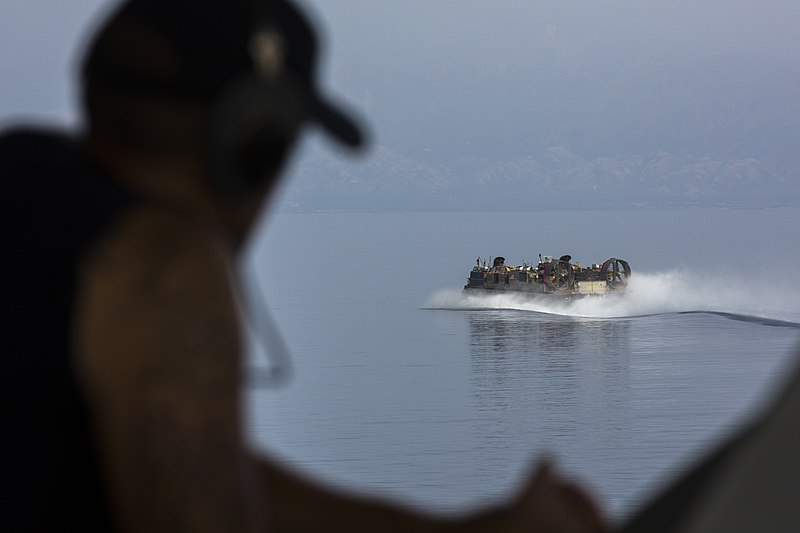 File:U.S. Navy Seaman Apprentice Jeremy Marshall watches as Landing Craft, Air Cushion 36 transports Marine Corps light armored vehicles and Humvees assigned to the 26th Marine Expeditionary Unit (MEU) from 130527-N-SB587-040.jpg