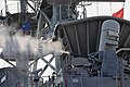 USS Bonhomme Richard fires a CIWS. (8744199459).jpg