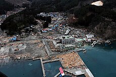 US Navy 110315-N-5503T-307 An aerial view of damage to Otsuchi, Japan, after a 9.0 magnitude earthquake and subsequent tsunami devastated the area in northern Japan.jpg