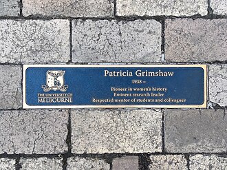 Plaque on Professors' Walk at the Parkville campus of Melbourne University. University of Melbourne Award Bronze Plaque Patricia Grimshaw.jpg