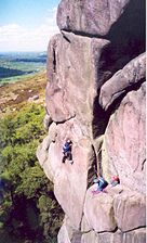 Climber on "Valkyrie" at The Roaches in Staffordshire, United Kingdom