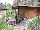 Water wheel powering a small village mill at the Museum of Folk Architecture and Life, Uzhhorod, Ukraine Waterwheel-Uzhhorod.jpg