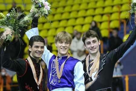 The men's podium. From left: Stéphane Lambiel (2nd), Tomáš Verner (1st), Brian Joubert (3rd).