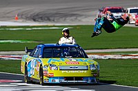 Edwards does his signature backflip, after winning at Texas Motor Speedway 2008 NASCAR Sprint Cup Series, Texas..jpg