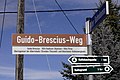 image=https://commons.wikimedia.org/wiki/File:2019_Kleinnaundorf_Wegweiser_Guido-Brescius-Weg.jpg