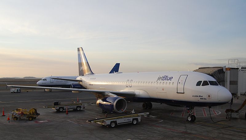 File:Airbus A320, JetBlue at Logan, as the sun rises. "A Little Blue Will Do". (4931018743).jpg