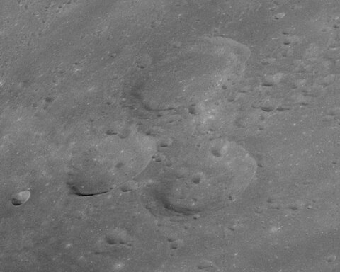 Oblique view of Bilharz (top), Atwood (lower left), and Naonobu (lower right), from Apollo 11 Atwood Bilharz Naonobu craters AS11-42-6218.jpg