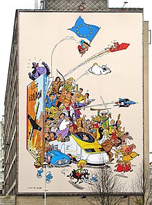 Personnages de bandes dessinées disposés en groupe sur une fresque murale.