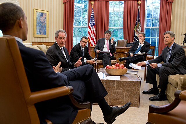 Barack Obama meets with advisors in the Oval Office, Aug. 10, 2012