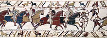 220px-Bayeux_Tapestry_scene51_Battle_of_Hastings_Norman_knights_and_archers.jpg