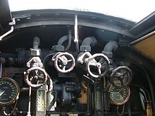 Pressure gauges on Blackmore Vale. The right-hand one shows boiler pressure, the one on the left steam chest pressure. Blackmore Vale boiler backplate.jpg