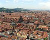 Bologna (the red terracotta roofs and brick towers of the city's skyline)