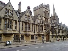 Brasenose College as it fronts on to the High Street, Oxford, with St Mary's in the background. Brasenose College from the High Street.jpg