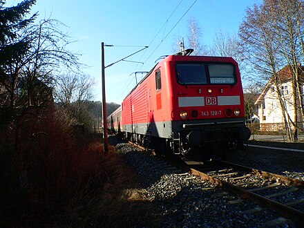 Train hauled by 143-128 at Coburg-Kalenderweg level crossing in 2008 DB 143 128 Coburg-Sonneberg-Bahn.jpg