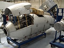 Nacelle-mounted Super Sprite with jettison recovery parachute on display at the Rolls-Royce Heritage Trust, Derby DH Super Sprite RRHT.jpg