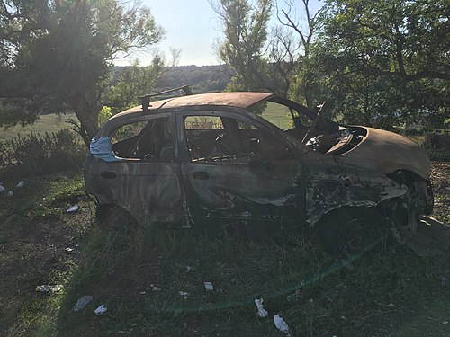 Damaged car in Rome