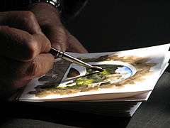 Dolceacqua43 - Artista locale mentre dipinge un acquarello.jpg