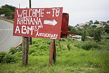 A sign points towards the eKhenana land occupation in Cato Manor, Durban. EKhenana Sign.jpg