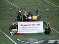 EMU President Dr. Susan Martin recognizes the Black Alumni Chapter as the 2010 Alumni Chapter of the Year during the third quarter of the 2010 homecoming football game against the Ohio Bobcats.