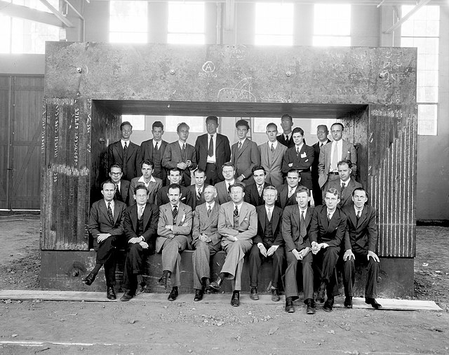 University of California Radiation Laboratory staff framed by the magnet for the 60-inch cyclotron, 1938; Nobel prize winners Ernest Lawrence, Edwin M