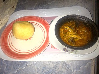 Eba (Garri from Cassava) served with Fresh fish banga (Palm Kennel) soup in a clay pot Eba served with Fresh fish banga soup in a clay pot.jpg