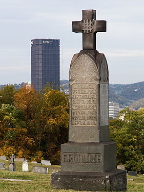 Cemetery monument in foreground; U. S. Steel Tower (Pittsburgh) in background