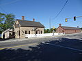 Gatekeeper's House and Pawtucket Gatehouse; southeast and northeast (front) sides shown. Located at the southeast end of the O'Donnell Bridge in Lowell, Massachusetts.