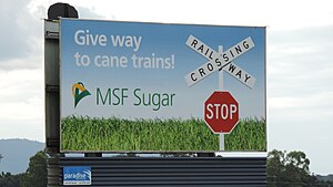 Sign warning about cane trains, 2016 Give way to cane trains!.jpg