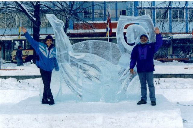 Mexican artist Abel Ramírez Águilar with an ice sculpture he created before the start of the Lillehammer Games