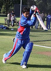 Hasti Gul swinging a bat in practice