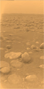 Surfaces like this of Saturn's moon Titan (taken by Huygens probe) bear superficial similarities to the floodplains of Earth Huygens surface color.jpg