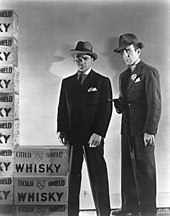 Cagney and Bogart in The Roaring Twenties (1939) James Cagney Humphrey Bogart The Roaring Twenties Still.jpg