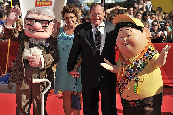 John Lasseter appears with characters from Up at the 2009 Venice Film Festival.