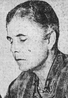 Kate M. Foley, from a 1928 newspaper photograph. A middle aged woman with short hair, looking down.