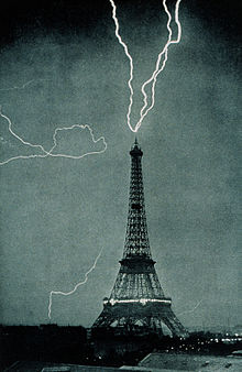 Lightning strikes the Eiffel Tower, France in 1902.