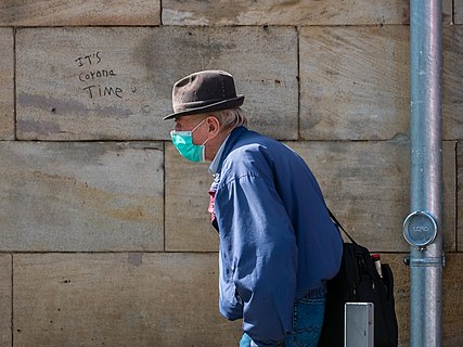 Man with prescribed protective mask at the Bamberg railway station