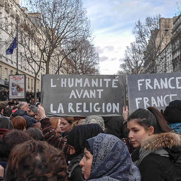 "Humanity before religion." Paris rally in support of the victims of the 2015 Charlie Hebdo shooting.