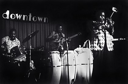 Ben Brown (center) with Mickey Roker (left), Dizzy Gillespie (right), and Rodney Jones (hidden), in Buffalo, New York, 1977 Mickey Roker & Dizzy Gillespie 2.jpg