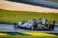 Action Express Racing's Mustang Sampling Racing Cadillac DPi- V.R. at the Petit Le Mans. Mustang Cadillac DPi- V.R.jpg