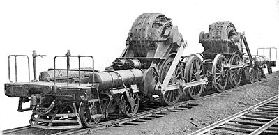 The Pennsylvania Railroad's class DD1 locomotive running gear was a semi-permanently coupled  pairing of third rail direct current electric locomotive motors built for the railroad's initial New York-area electrification when steam locomotives were banned in the city (locomotive cab removed here).