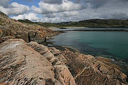 View of Oldshoremore from the slopes of Eilean na h-Aiteig Rocky coastline beyond Oldshoremore Beach - geograph.org.uk - 443294.jpg