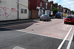 This image depicts, from the Estcourt Street side, the top terminus of the paving scheme.