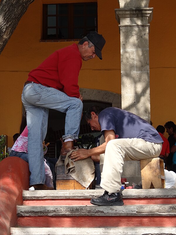 Shoeshiner at work in Tepotzotlan, Mexico.