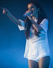 Gomez performing on the Stars Dance Tour (2013). Stars Dance Tour, Norway 5 cropped.jpg