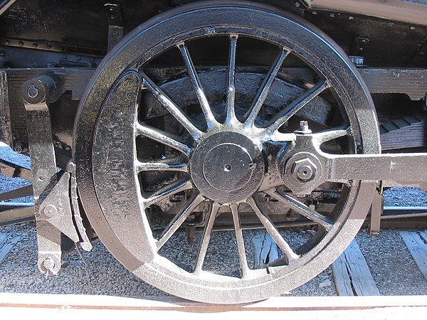A driving wheel on a steam locomotive.