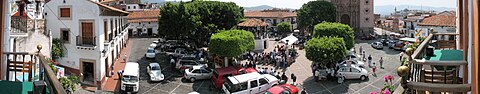 Taxco Zocalo panoramic view with children's celebration at Plaza Borda