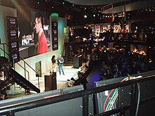 The contest's World Championship at the TGS 2004. Finalists played on walkways above the crowd while commentators talked about their actions on the big screen. The Ninja Gaiden Master Tournament World Championship proceeding on at Tokyo Game Show 20040925.jpg