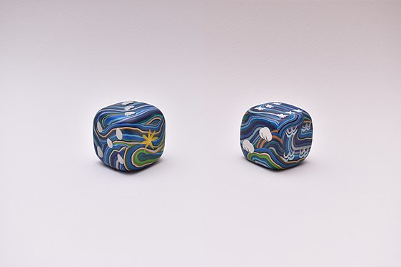 The weather dice (made of polymer clay).