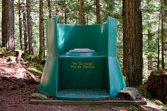 Throne over the woods style composting toilet at campsite 32 in Bowron Lakes Provincial Park, BC