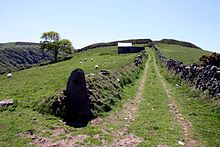 Wind Hill, near Countisbury, Devon, possibly the site of the Viking defeat at the hands of local men in 878. Some mediaeval sources claim that Ubba led the vanquished army, and that he was among those slain. Track up Wind Hill.jpg